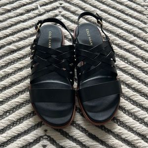 Cole Haan black sandals with gold details